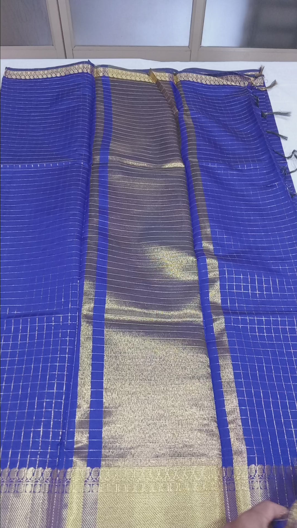 Kanchipuram Silk saree with Gold Zari mini checkered pattern with Gold Butta all over saree and pallu in Blue Color