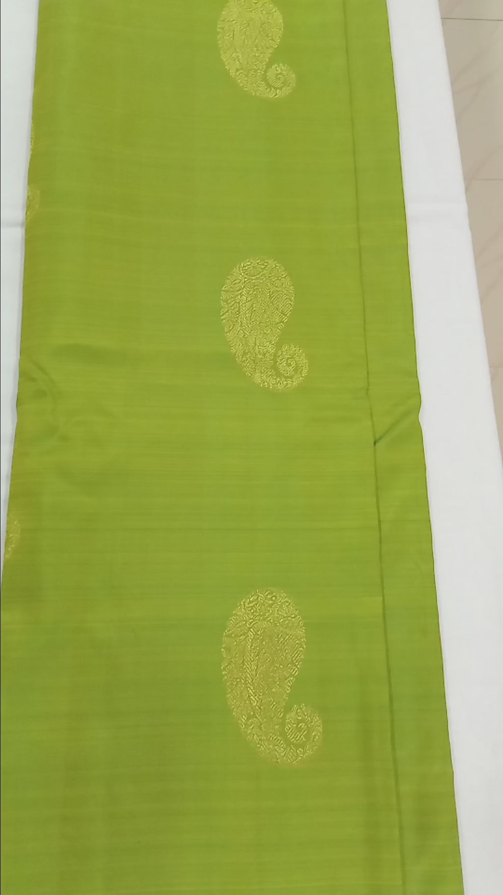 Kanchipuram Pure Silk Saree with bright gold Zari Motifs in Fresh Green leaf Color