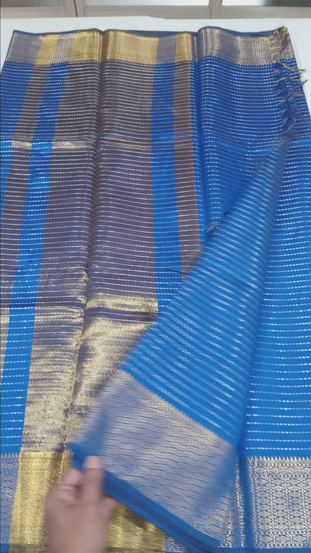 Kanchipuram Silk saree with Gold Zari Lined pattern with Gold Butta all over saree and pallu in Blue Color