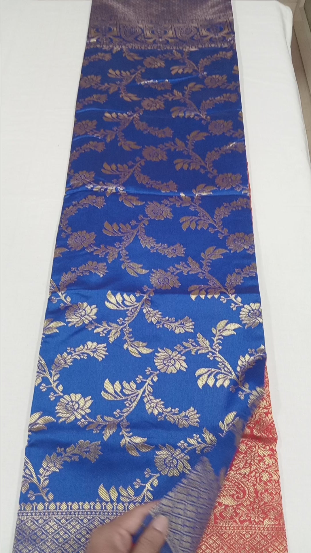 Banarasi Pure Silk Saree with luxurious Gold Zari Floral Buttas all over the saree and Pallu in Royal Blue Red Color