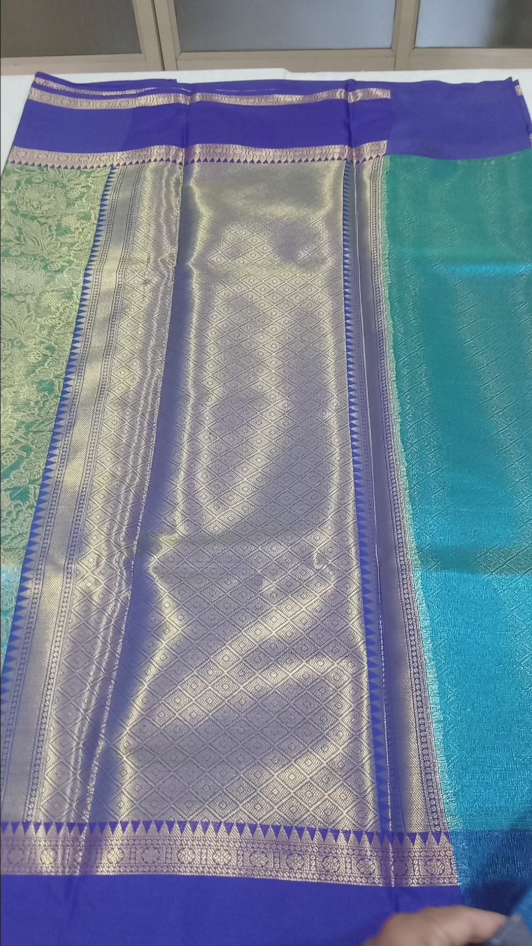 Kanchipuram Silk saree with Gold Zari pattern with Gold Butta all over saree and pallu in Greenish Blue Color