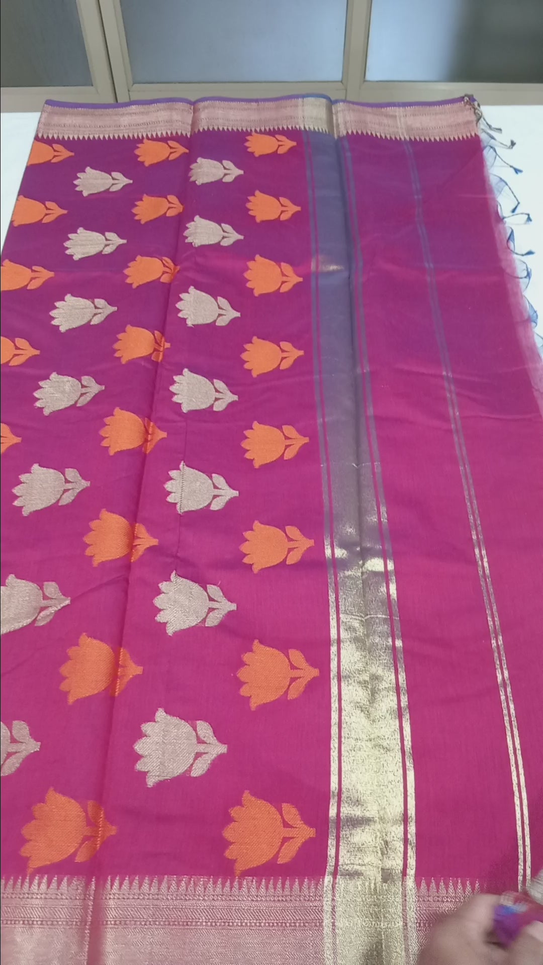 Chandheri Silk Saree with Flower Polka Dots Buttas with Gold Zari Border and Tassels in Reddish Red color with gold green buttas