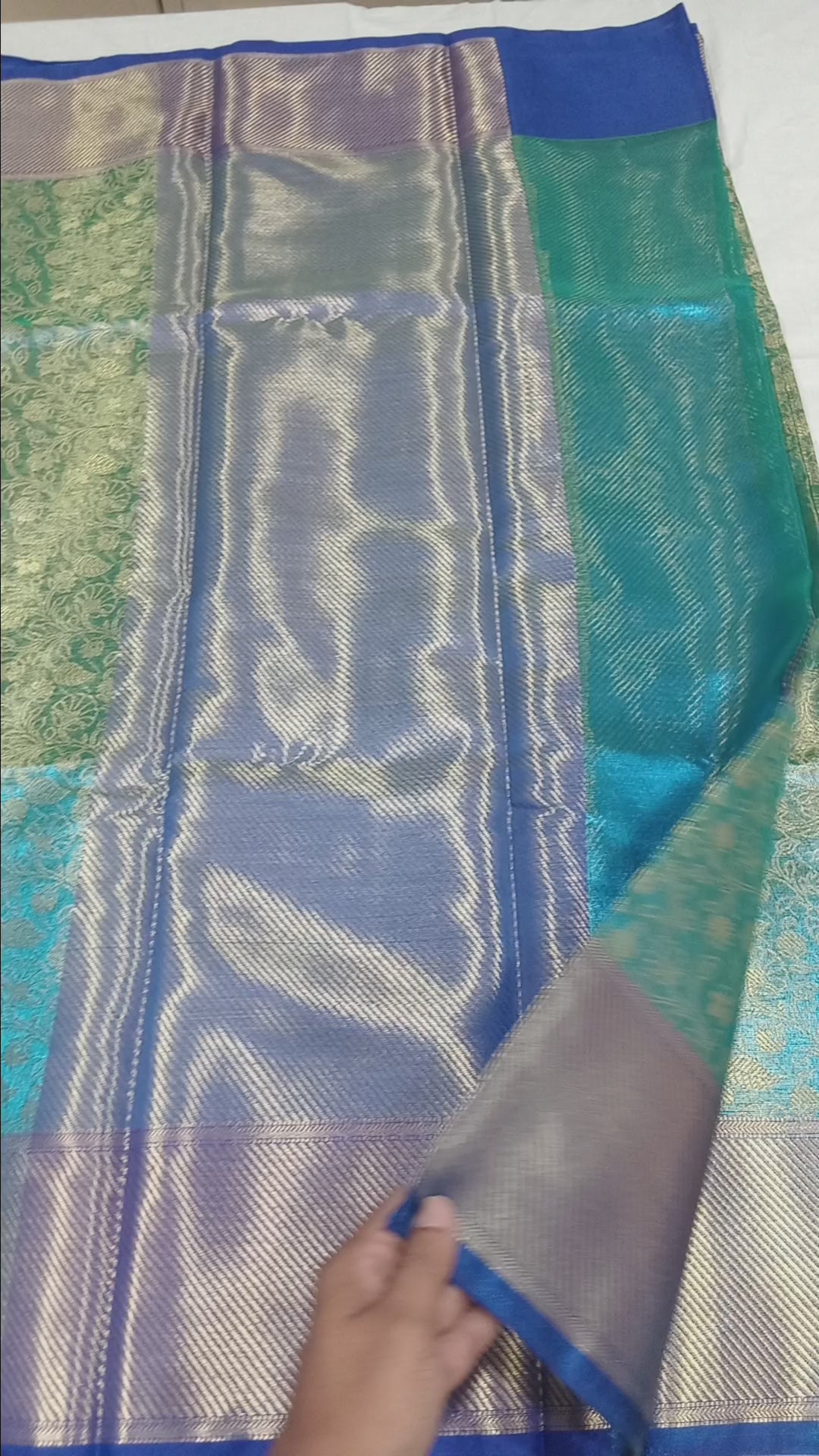 Kanchipuram Silk saree with Gold Zari pattern with Gold Butta all over saree and pallu in Aqua Green Blue Color