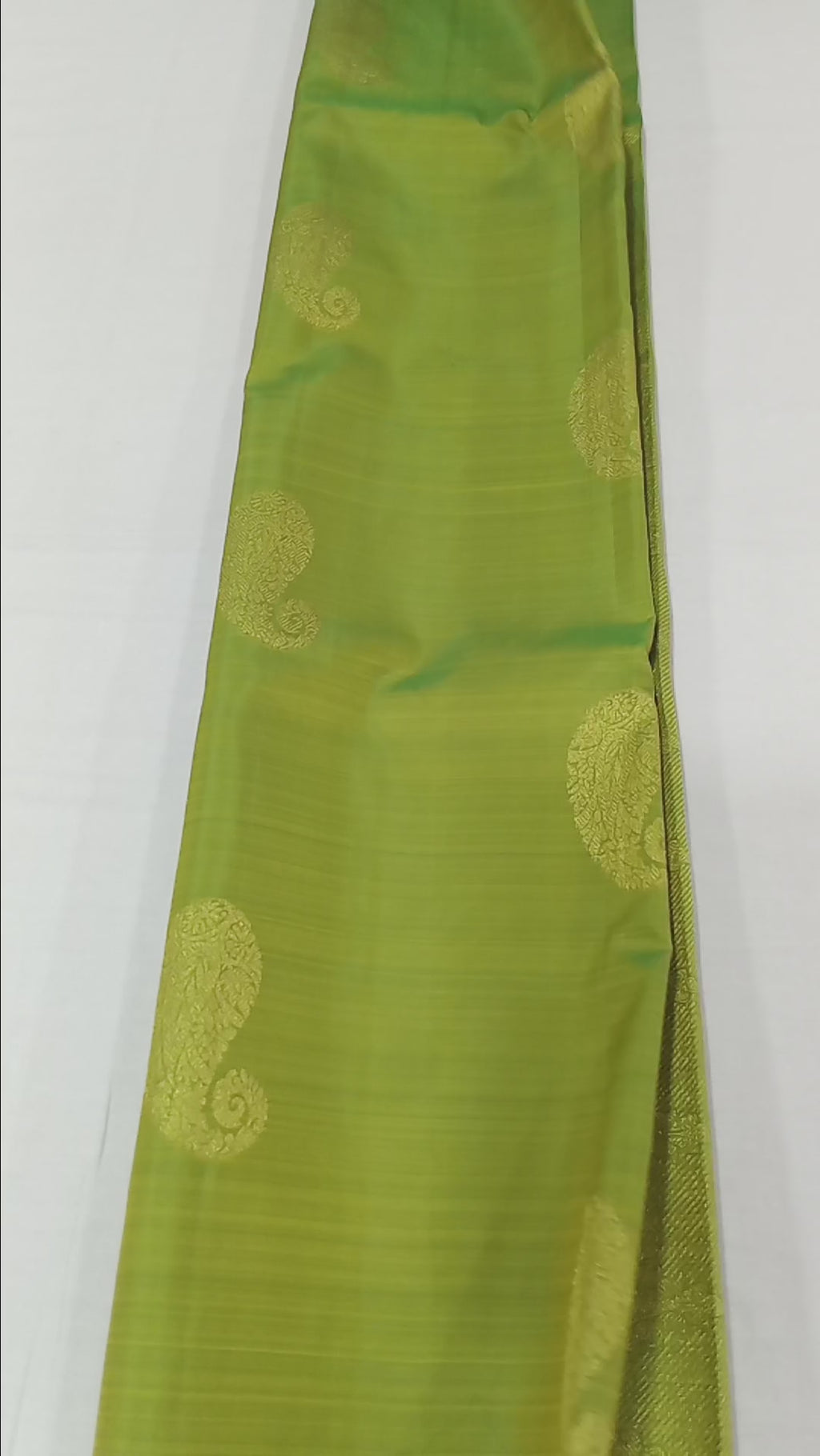 Kanchipuram Pure Silk Saree with bright gold Zari Motifs in Fresh Green leaf Color